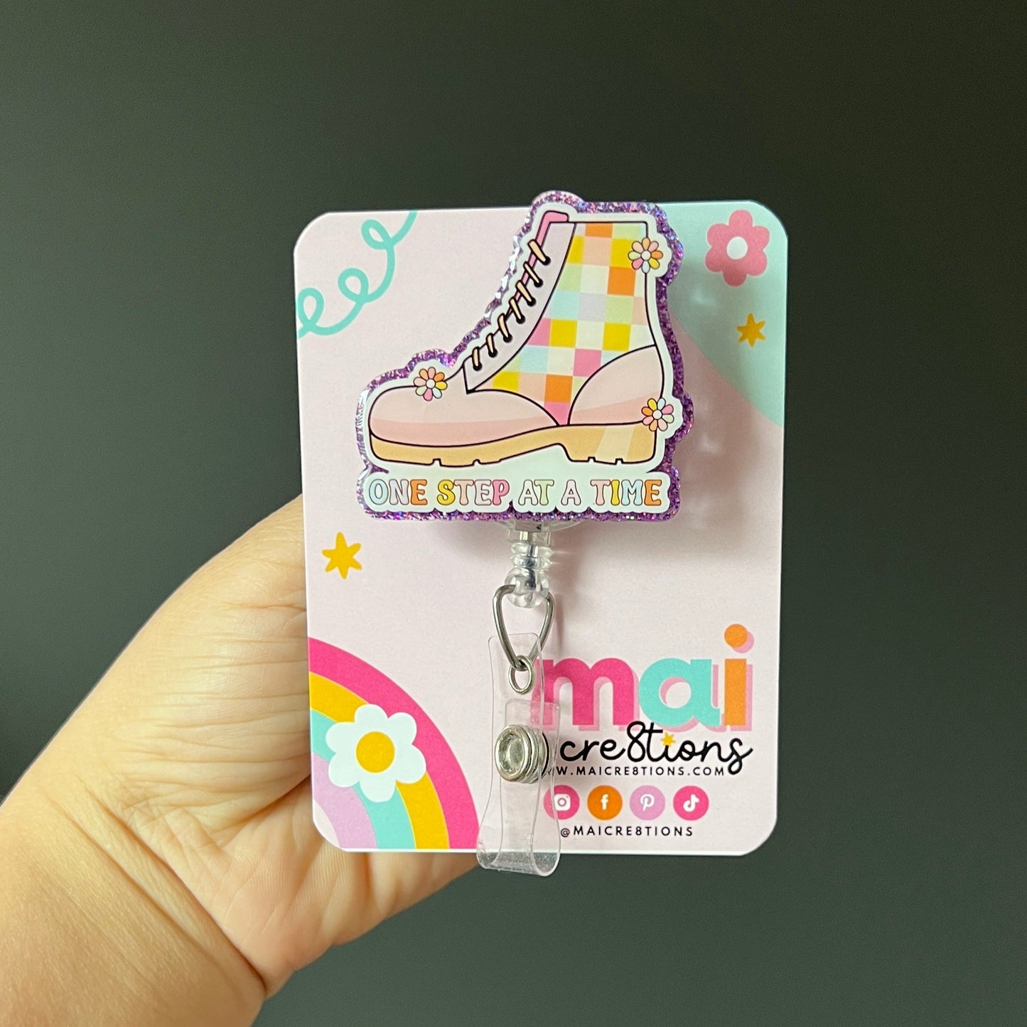 One step at a time retro shoes badge reels