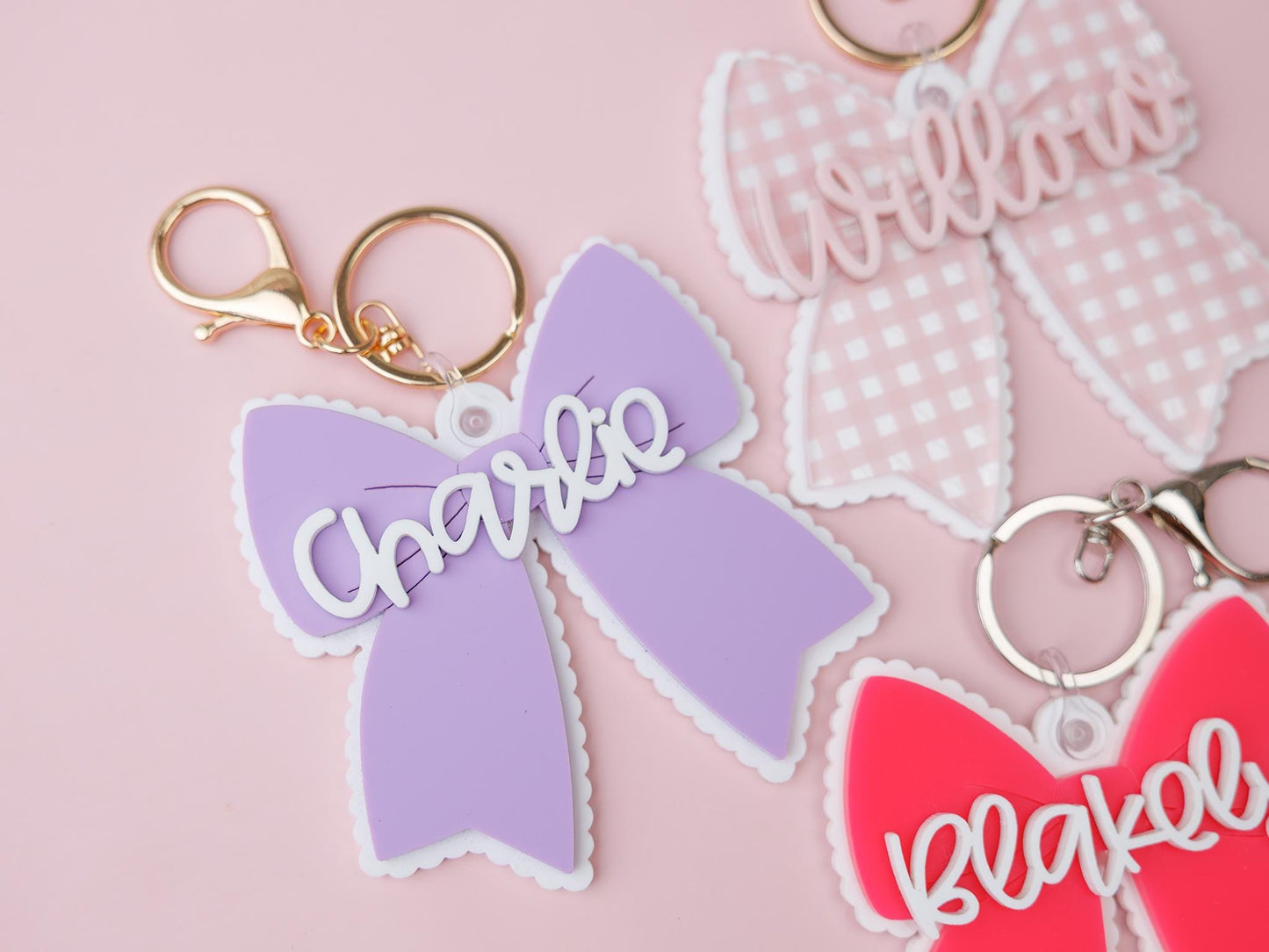 Scallop bow backpack name tag