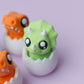 Baby dinosaur 3D printed fidget clickers