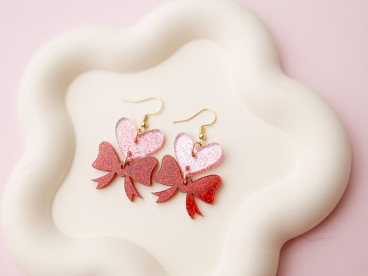 Heart and bow acrylic earrings