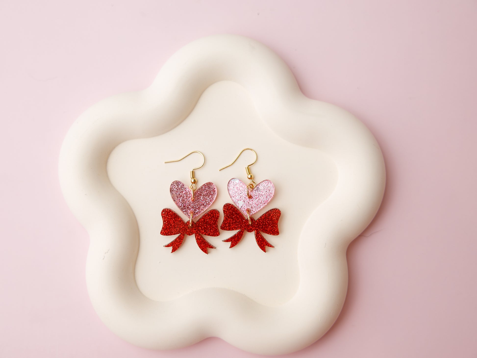 Heart and bow acrylic earrings