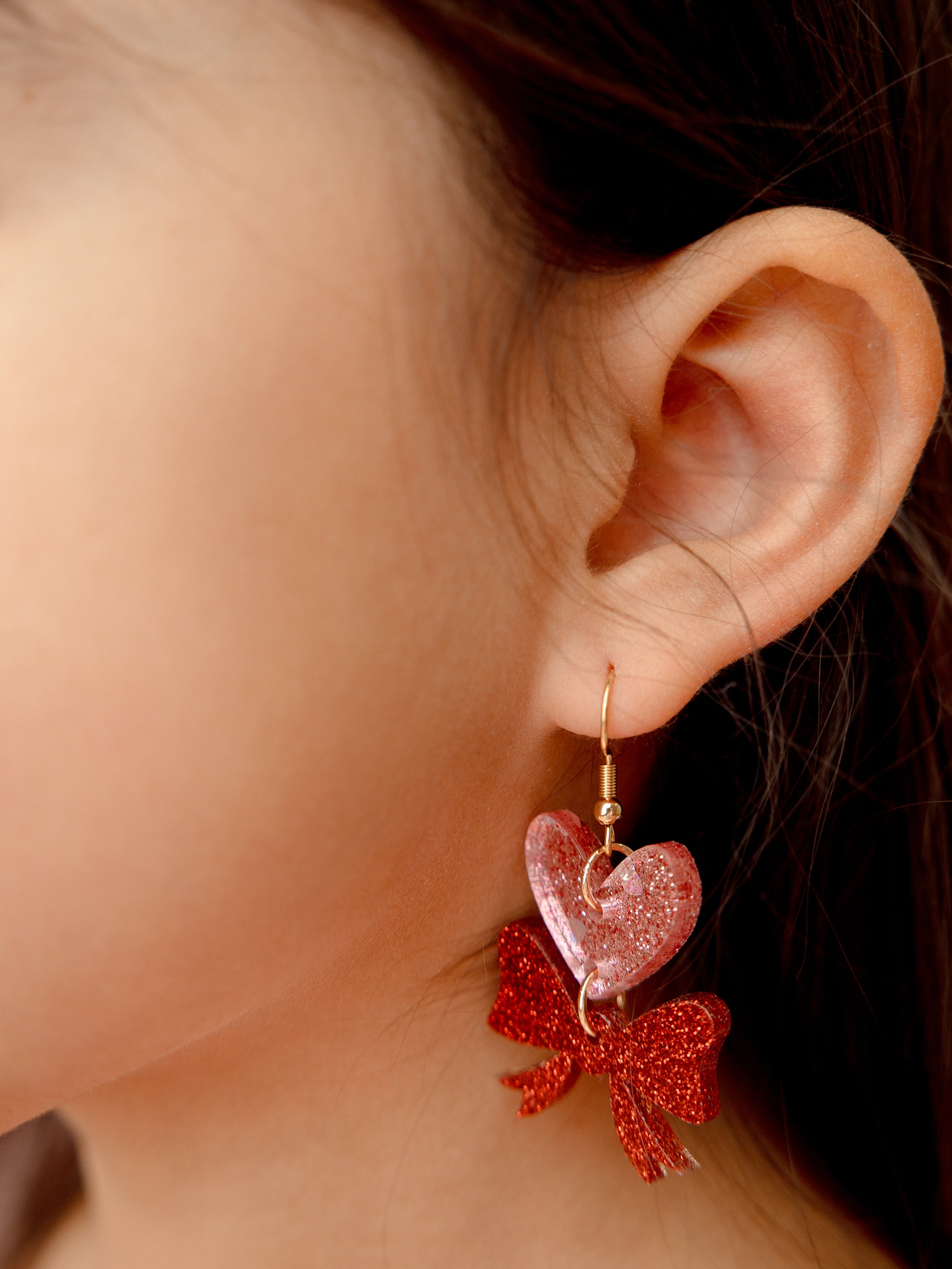 Heart and bow acrylic earrings