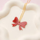 Red bow acrylic necklace