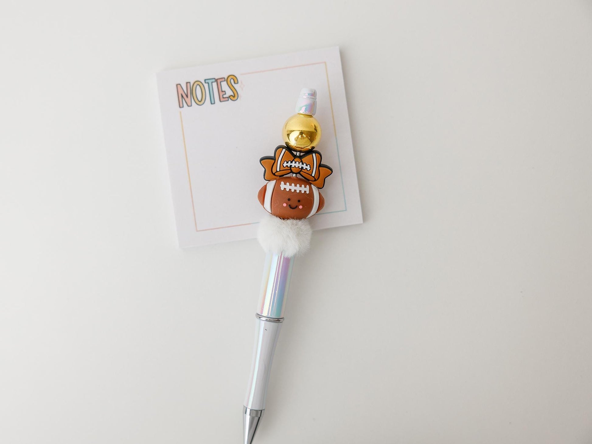 Cute football with bow beaded pen