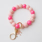 Pink coquette bow Beaded Wristlet Keychain with charm