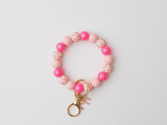 Pink coquette bow Beaded Wristlet Keychain with charm
