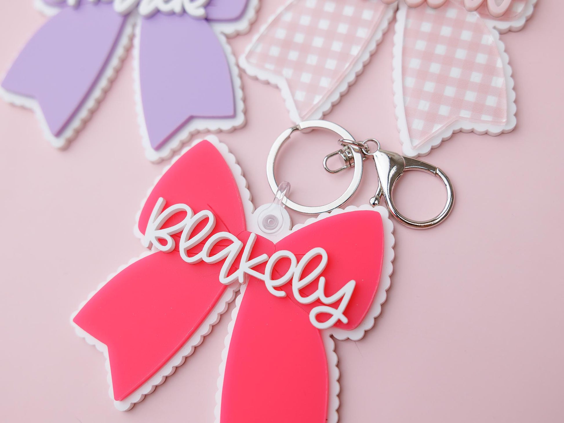 Scallop bow backpack name tag