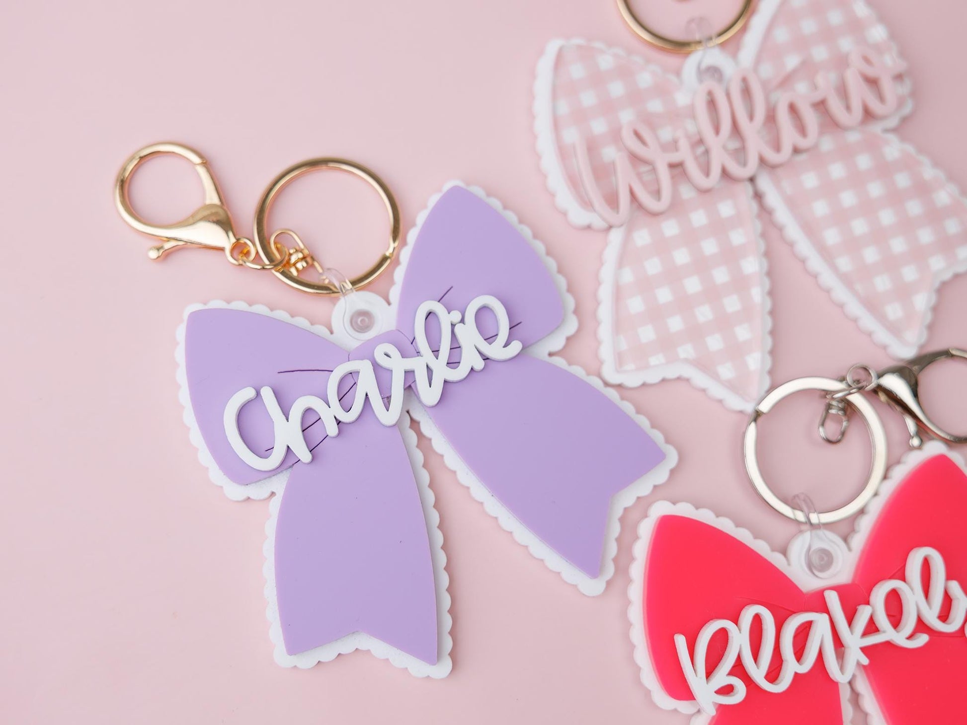 Scallop bow backpack name tag