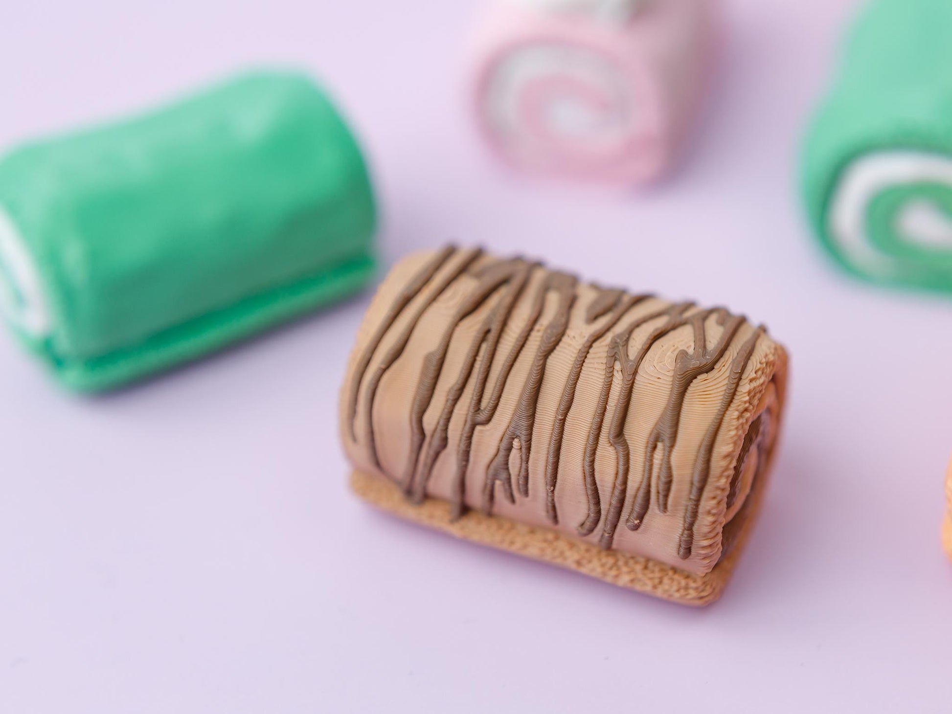 Cute cake roll Fidget clicker toy Trendy 3D printed Cute fidget clicker